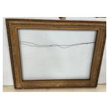 46"h., 56"w Gilded ornate gold frame