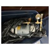 Gast rotary vane vacuum pump.