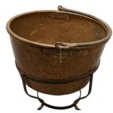 16"h., 28"dia Antique copper cauldron on a stand