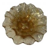 7" Marigold carnival glass bowl with a scalloped
