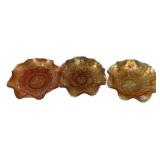 Three Marigold Carnival Glass Bowls