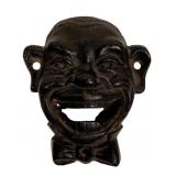 Cast iron bottle opener. 3.5'w  x 4't