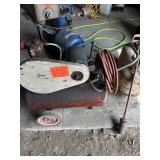 Air compressor with hose