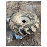 14.9-24 new Tire mounted on Case IH rim