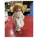 2 vintage 8-inch porcelain dolls with tags and