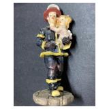 Firefighter with little girl figurine