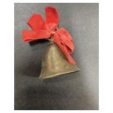 Vintage silver tone metal bell with red bow