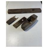 Old wood plane and level