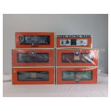Lionel Electric Trains Holiday Series Box Cars - Lot of 8 in Boxes