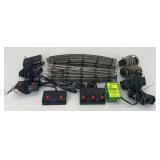 Postwar Lionel 456c, four RCS/UCS controllers, four 022c controllers, switch machine, 027 wide radius track