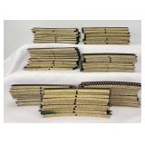 Sixty-eight sections of Marklin HO Gauge 5100 1/1 curved M track