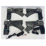 Modern Lionel O Gauge remote control switches, two 5132 right hand and two 5133 left hand