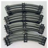 Thirty-four postwar Lionel sections of factory O gauge track w/dull gray rails