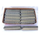 One hundred thirty-one Marklin HO Gauge 5106 1/1 straight sections of M track