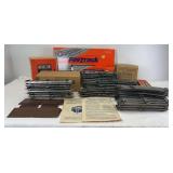 Large group of Postwar Lionel O Gauge 027 straight and curved track, 1033 in ob, 6019 in ob