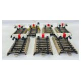 Group of seven Marklin HO Gauge stop blocks, 5129 and 7190, one illuminated