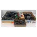 Large group of postwar Lionel O Gauge 022 switches, controllers, lamps, lanterns, fixed voltage plugs