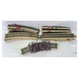 Group of Marklin HO Gauge straight and curved feeder sections of M track