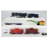 Postwar American Flyer S Gauge 283 4-6-2 steam loco, 42597 C&NW crane, 930 ill. caboose, 630 ill. Reading caboose