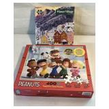LOT OF 2  PUZZLES,WINTER VILLAGE,& PEANUTS