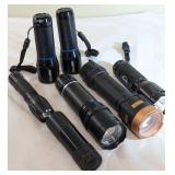 Seven Flashlights by Various Makers