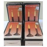 4 Boxes of Wooden Candle Holders
