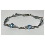 Sterling Silver Oval Blue Topaz & CZ Bracelet