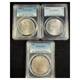 1884-O, 1885-O, 1887 Morgans PCGS MS64