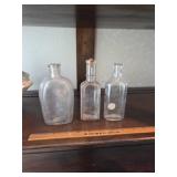 Three Clear Vintage Glass Bottles
