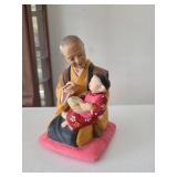 Hand-Painted Ceramic Figurine of Elder and Child b