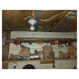 Pipe Clamps and Bar Clamps on Pegboard Rack