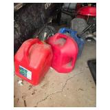 Three Plastic Gasoline Containers in Red and Blue