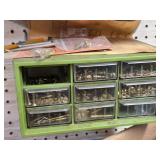 Green Plastic Organizer with Drawers Containing Sc