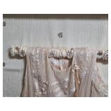Framed Beige Sheer Dress on Embroidered Backdrop