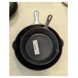 (2) cast iron frying pans