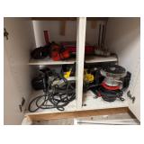corded tools in cabinet