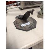 brass peacock sundial
