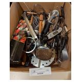 box of kitchen utensils