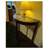 green marble hall table and gold table lamp