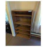 Press board book shelf