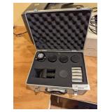 Metal Celestron case with lens