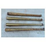 Four Brass Tapered Cylinders with Knobbed Ends