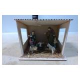 Small Nativity Scene with Ceramic Figurines in a W