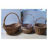 Three Assorted Handwoven Wicker Baskets with Handl