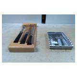 Two Sets of Cheese Knives: Wood and Black Handles