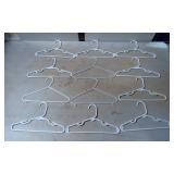 12 White Plastic Clothing Hangers