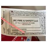 RED FIRE EXTINGUISHER - 4/25 INSPECTION