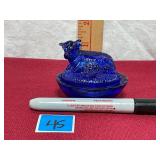 Vtg. 2 1/2 inch cobalt blue nesting cow.