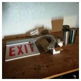 Exit Sign, Cups and Faucet Hoses