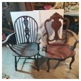 Two Chairs with Clawed Hand Arms